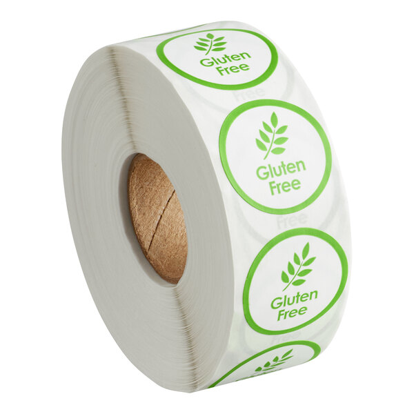 A roll of white and green Point Plus "Gluten Free" labels.