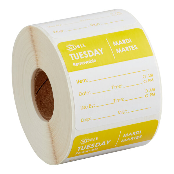 A roll of removable Tuesday day of the week labels from Noble Products, each measuring 2 inches by 2 inches.