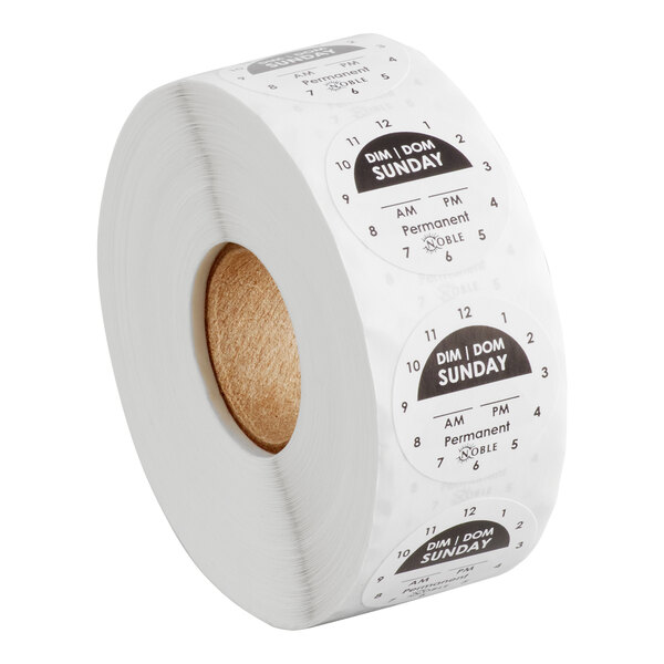 A roll of round adhesive labels marked for Sunday with clock times and permanent adhesive.