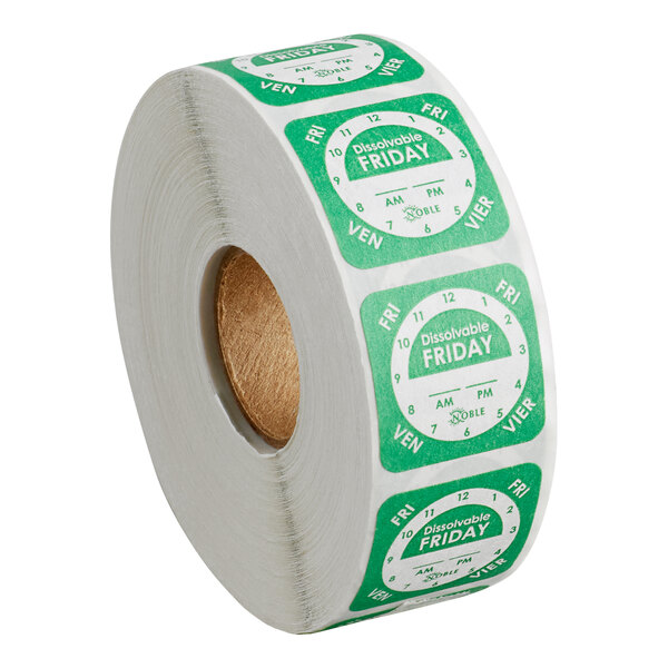 A roll of green and white dissolvable Friday day of the week clock labels.