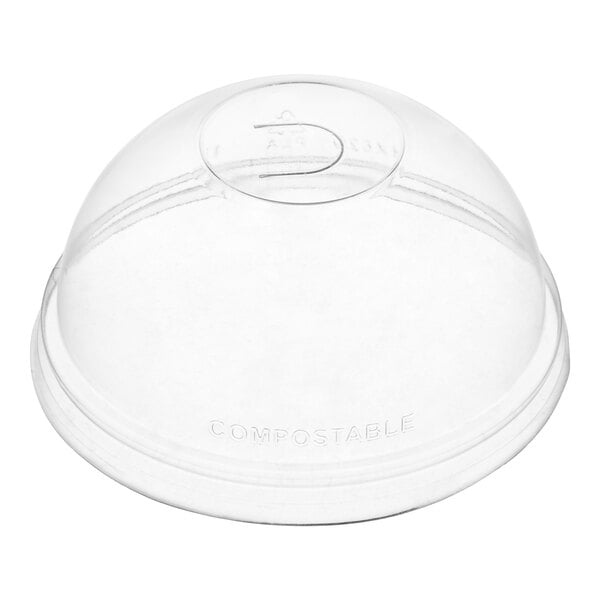A translucent compostable dome lid with a hole, designed for use with 9 to 22 oz. cold cups.