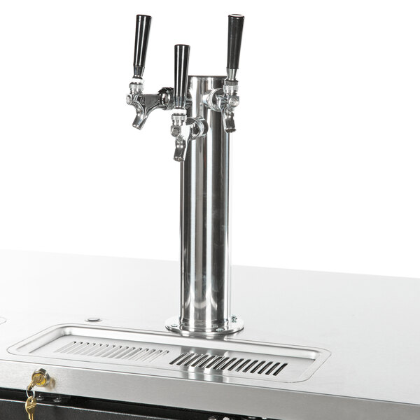 A Beverage-Air black beer dispenser with a stainless steel beer tap on a counter.