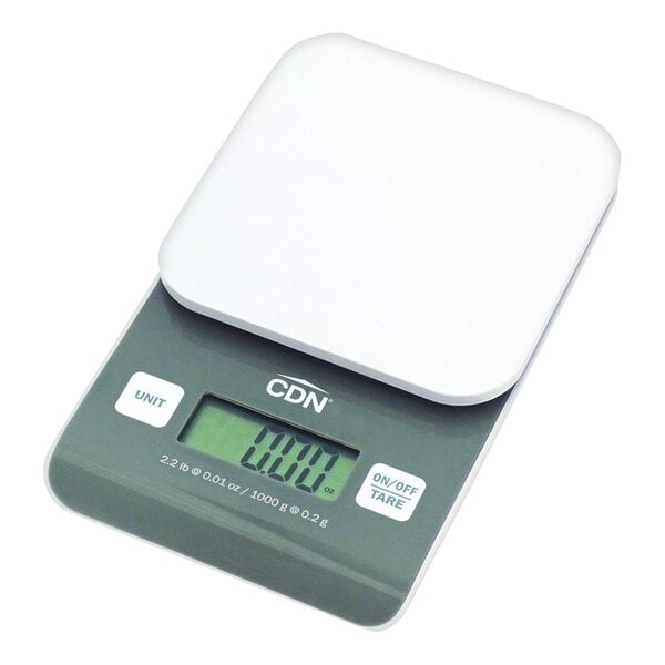 A CDN digital portion scale with a white display.