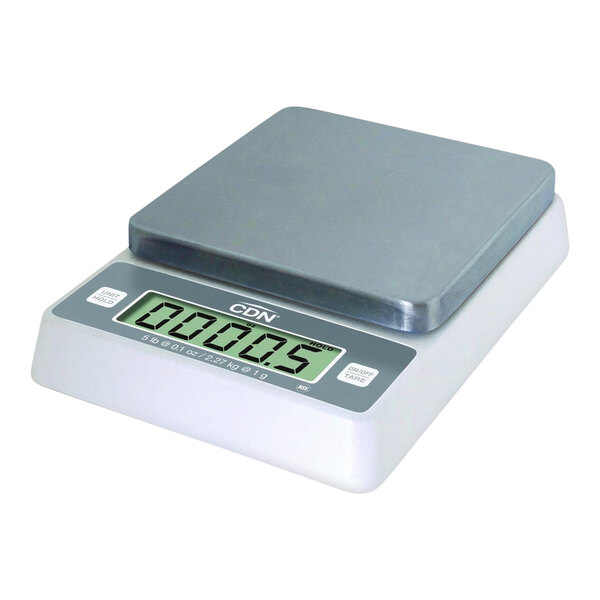 A CDN digital portion scale display the weight on a digital screen.
