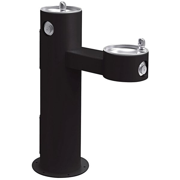 A black outdoor Elkay bi-level drinking fountain with two silver faucets.