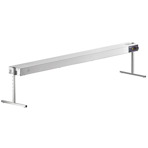 A white metal ServIt strip warmer with adjustable metal legs.
