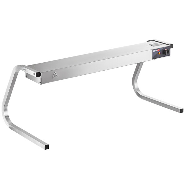 A ServIt stainless steel strip warmer on a metal table.