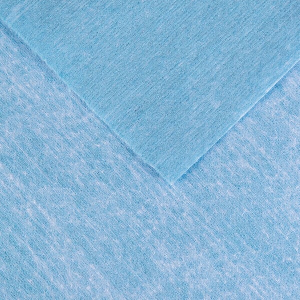 A close-up of a blue fabric.
