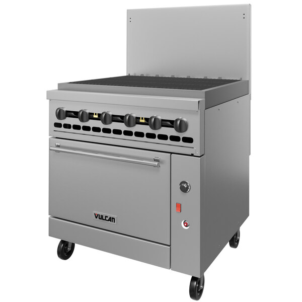 A large stainless steel Vulcan commercial gas range with a charbroiler on top.