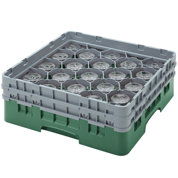 A green and gray plastic container with clear glass bottles inside.