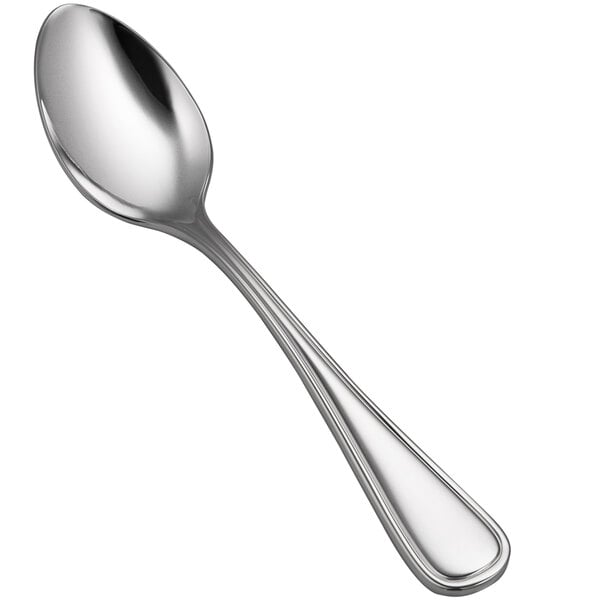 A Bon Chef Ravello teaspoon with a silver handle and spoon.