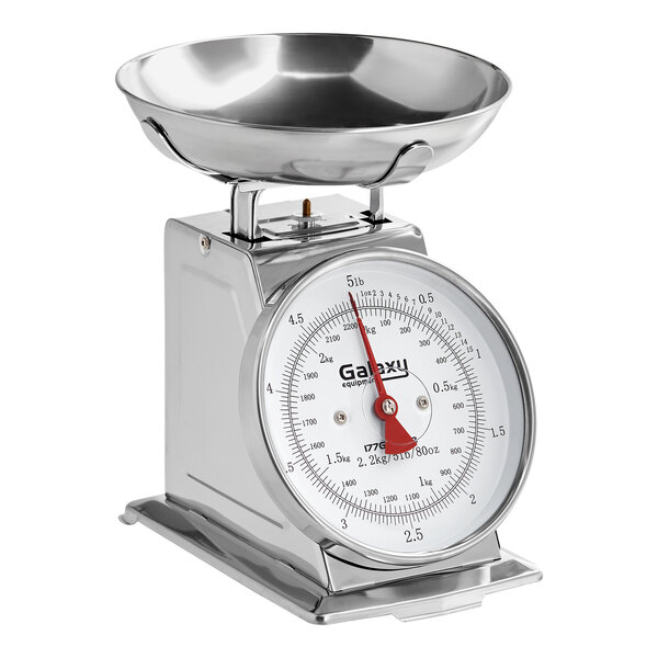 A mechanical portion control scale with a removable stainless steel bowl.