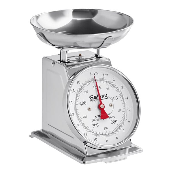 A mechanical portion control scale with a removable stainless steel bowl.