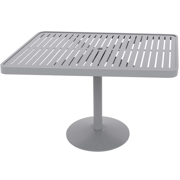 A grey rectangular table with a metal pedestal base and slats on top.