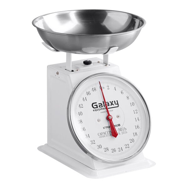 A mechanical portion control scale with a removable stainless steel bowl and a large analog dial.