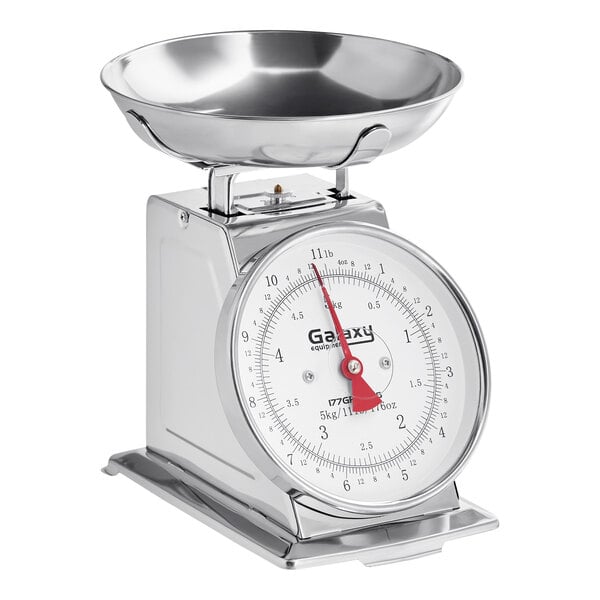A mechanical portion control scale with a removable stainless steel bowl.