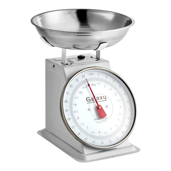 A mechanical portion control scale with a removable stainless steel bowl.