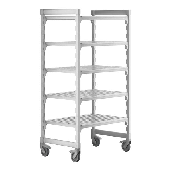 A white metal Cambro Camshelving® Premium mobile shelving unit with shelves.