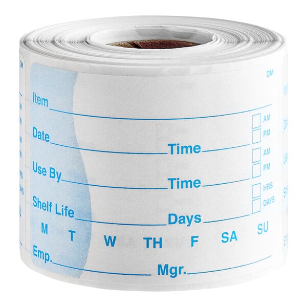 A roll of DayMark dissolvable food rotation labels with blue and white text.