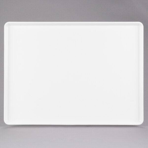 A white rectangular tray with a black border.