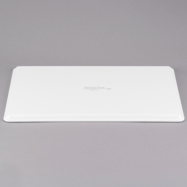 A white rectangular Cambro dietary tray with text on it.