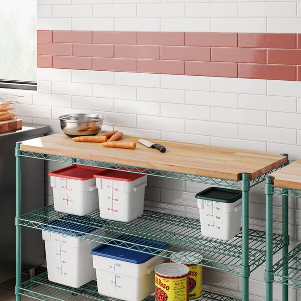 A Regency hardwood cutting board on a wire shelf above food containers.
