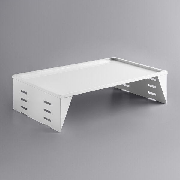 A white rectangular shelf for an Avantco refrigeration cabinet.