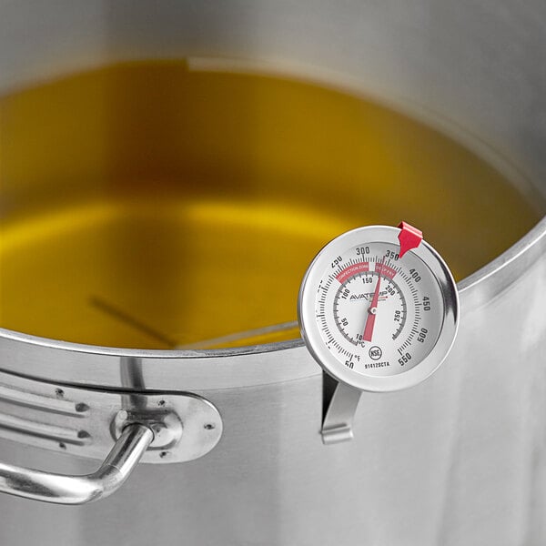 Fryer thermometer in a pot of oil