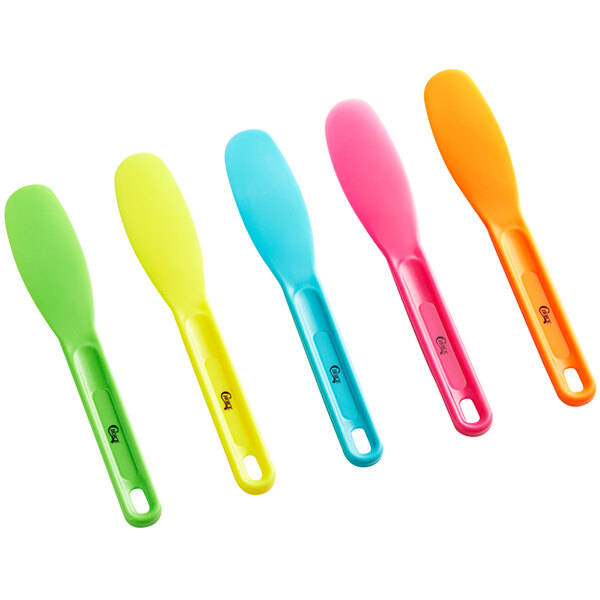 A set of five Choice sandwich spreaders with neon handles in different colors.