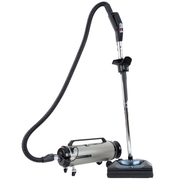 A MetroVac Professional Evolution canister vacuum with a hose attached to it.