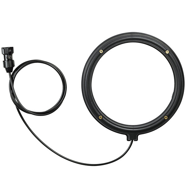 A black circular misting ring with a wire attached to it.