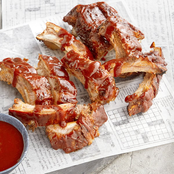 close up of ribs with sauce