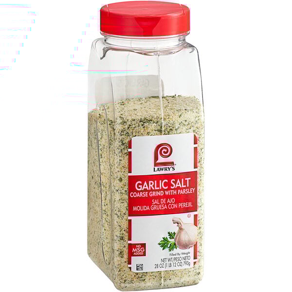 A clear container of Lawry's Garlic Salt with a red and white label and a green lid.
