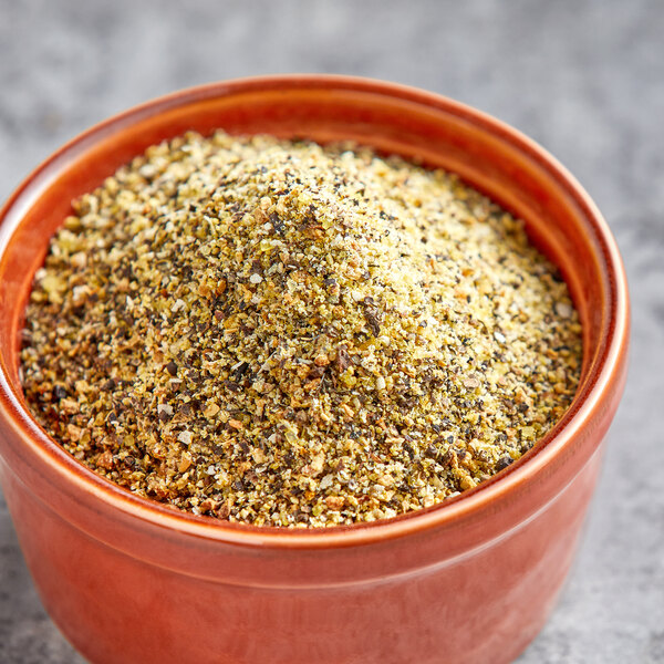 A bowl of Lawry's Lemon Pepper seasoning.