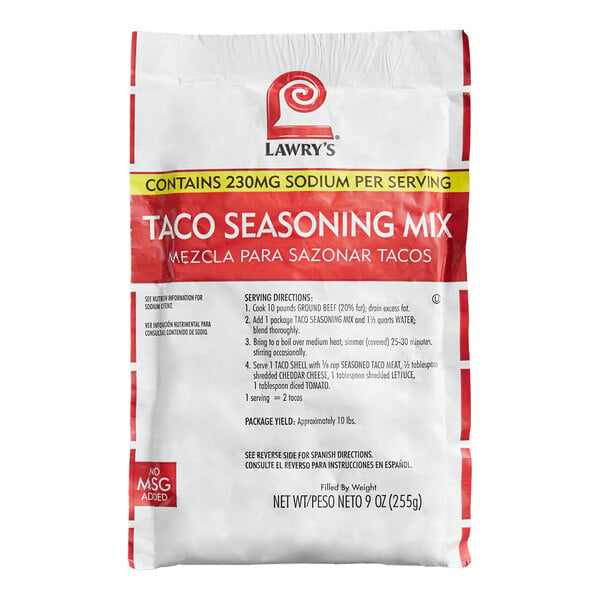 A white and red packet labeled "Lawry's Taco Seasoning Mix" with preparation instructions and nutritional information visible on the front.