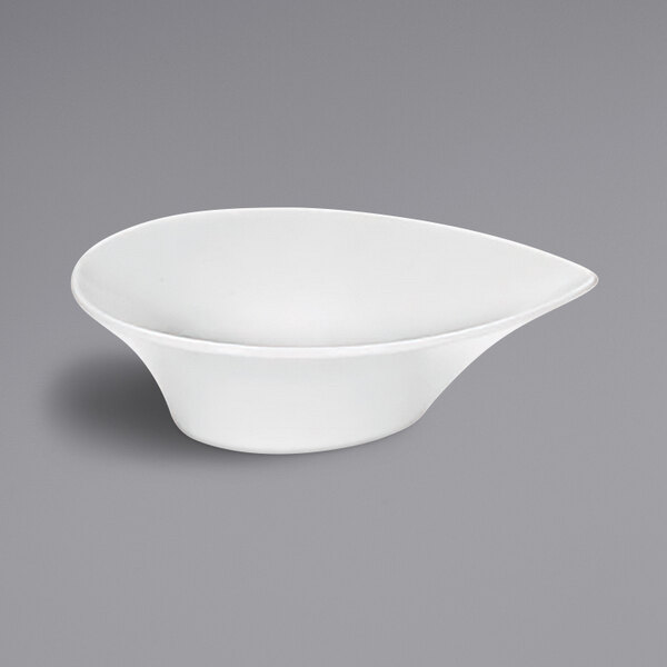 a white bowl with a pointy edge