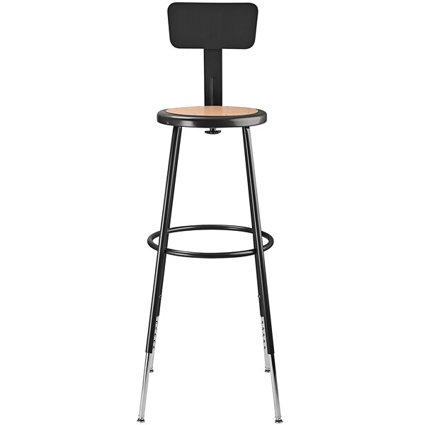A black National Public Seating lab stool with a round hardboard seat and adjustable backrest.