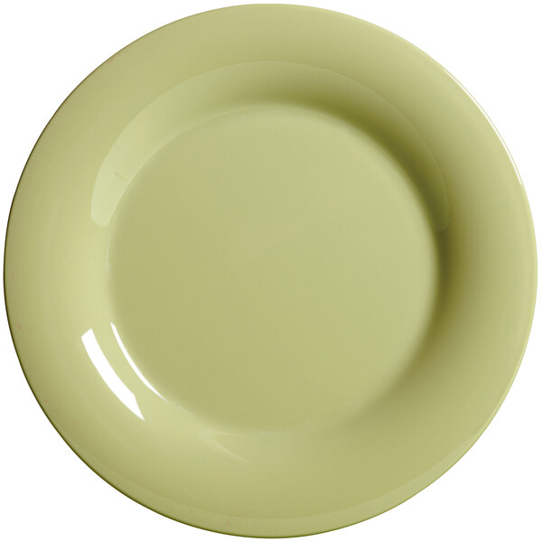 A close up of a green GET Diamond Harvest Avocado wide rim plate.