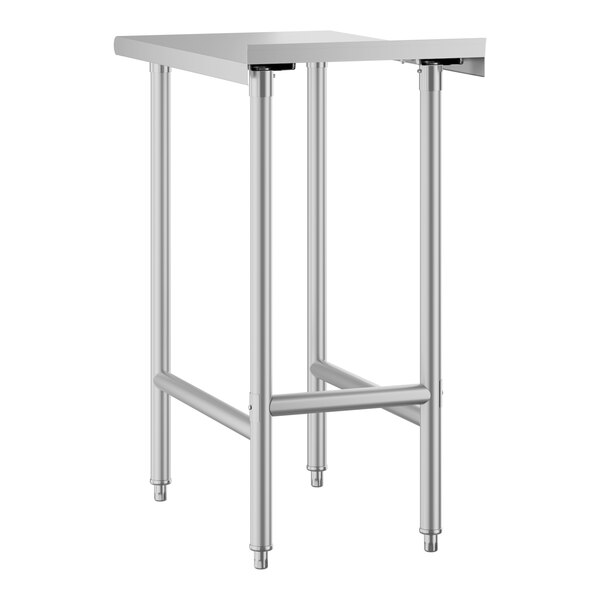 A silver stainless steel Advance Tabco filler table with metal legs.