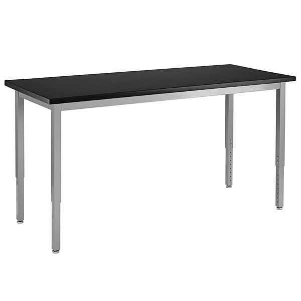 A black rectangular table with silver legs.