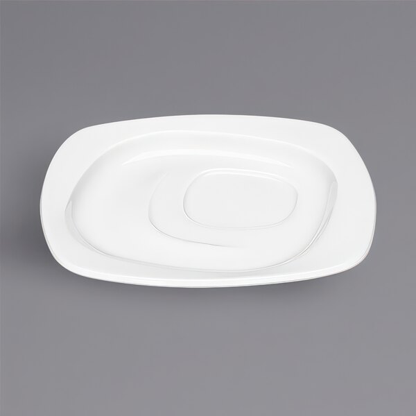 A Bauscher bright white square porcelain saucer with a curved edge.