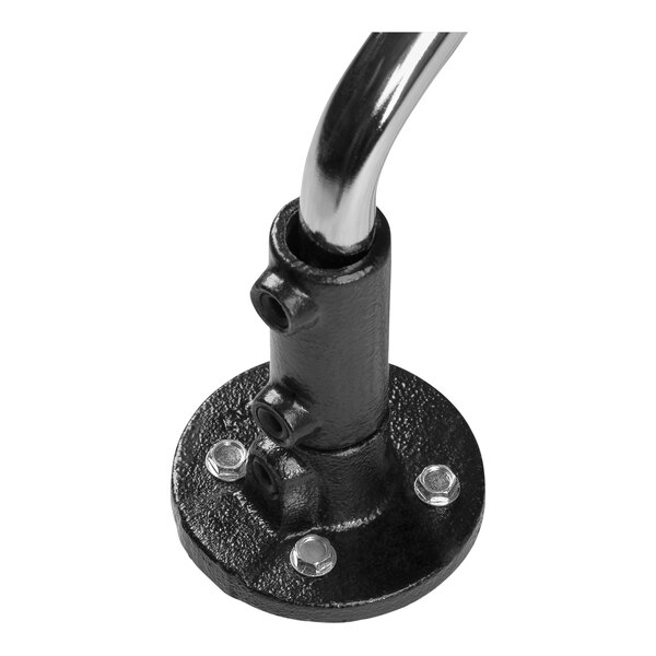 A close-up of a black metal pipe with screws.