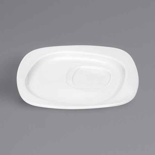 A Bauscher bright white square porcelain saucer with a square shape.