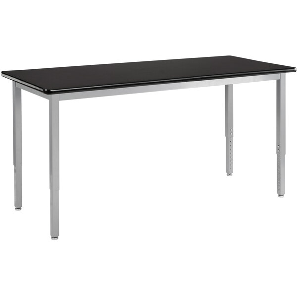 A black rectangular National Public Seating science lab table with silver legs and a gray top.