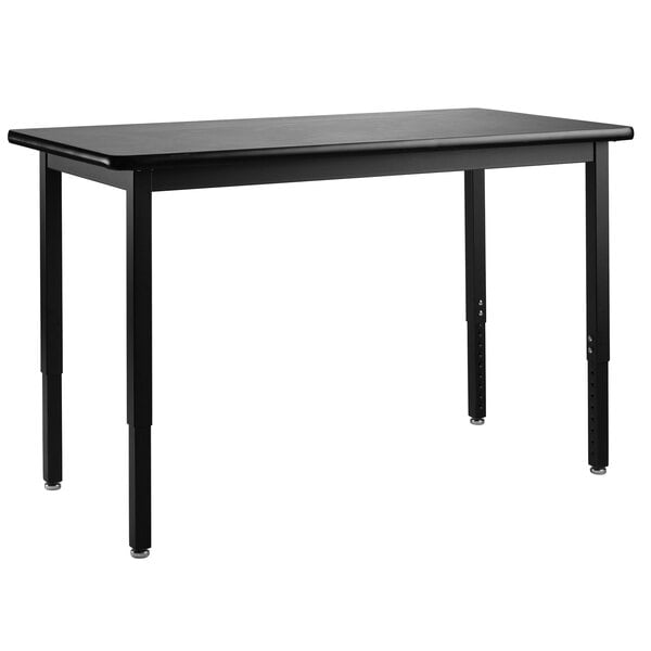 A black National Public Seating science lab table with rectangular legs and a high-pressure laminate top.