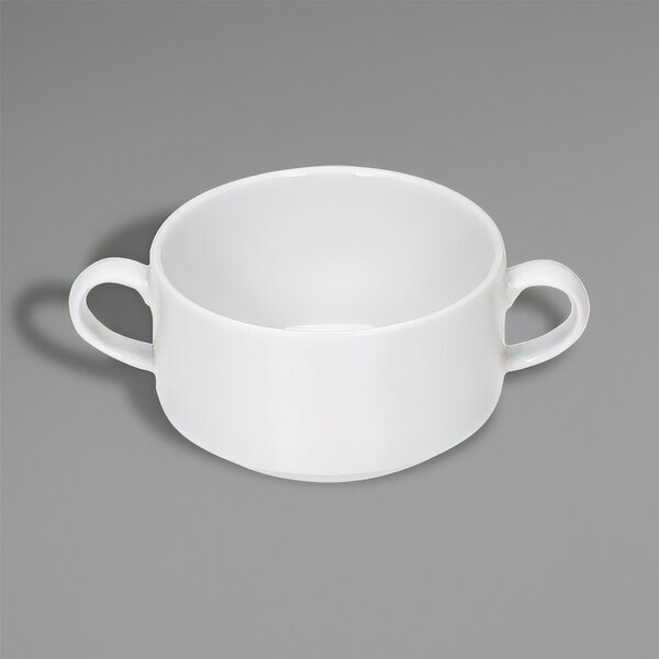 A Bauscher bright white porcelain bowl with two handles.