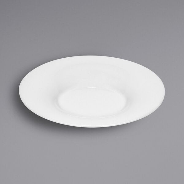 A Bauscher bright white porcelain deep plate with a wide rim on a white background.