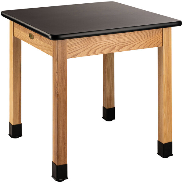 A National Public Seating science lab table with a black high-pressure laminate top.