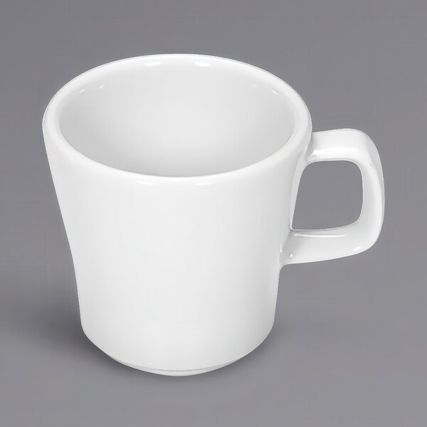 A Bauscher bright white tall cup with a handle.