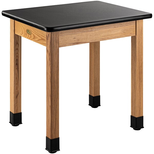 A National Public Seating science lab table with a black high-pressure laminate top.